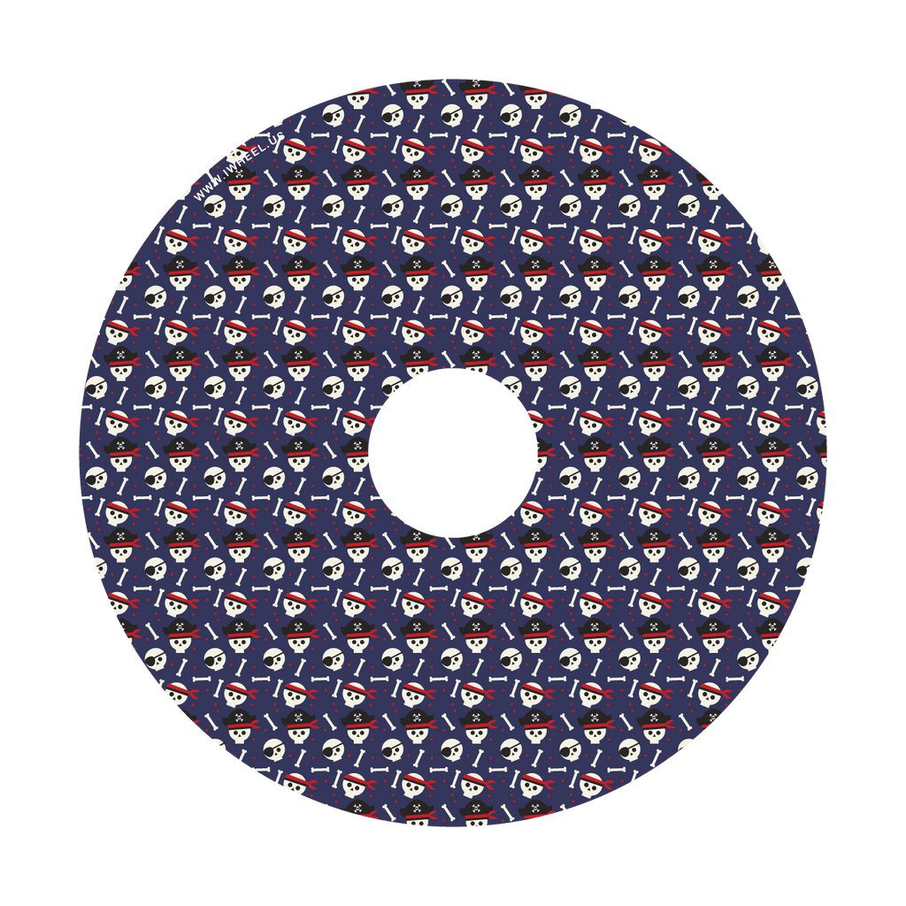 Close up picture of wheel covers with cute skull and pirate designs on a dark blue background