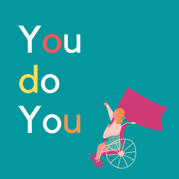 Text says you do you. A female in a wheelchair is holding a flag and is raising her fist up in the air to show pride and happiness.